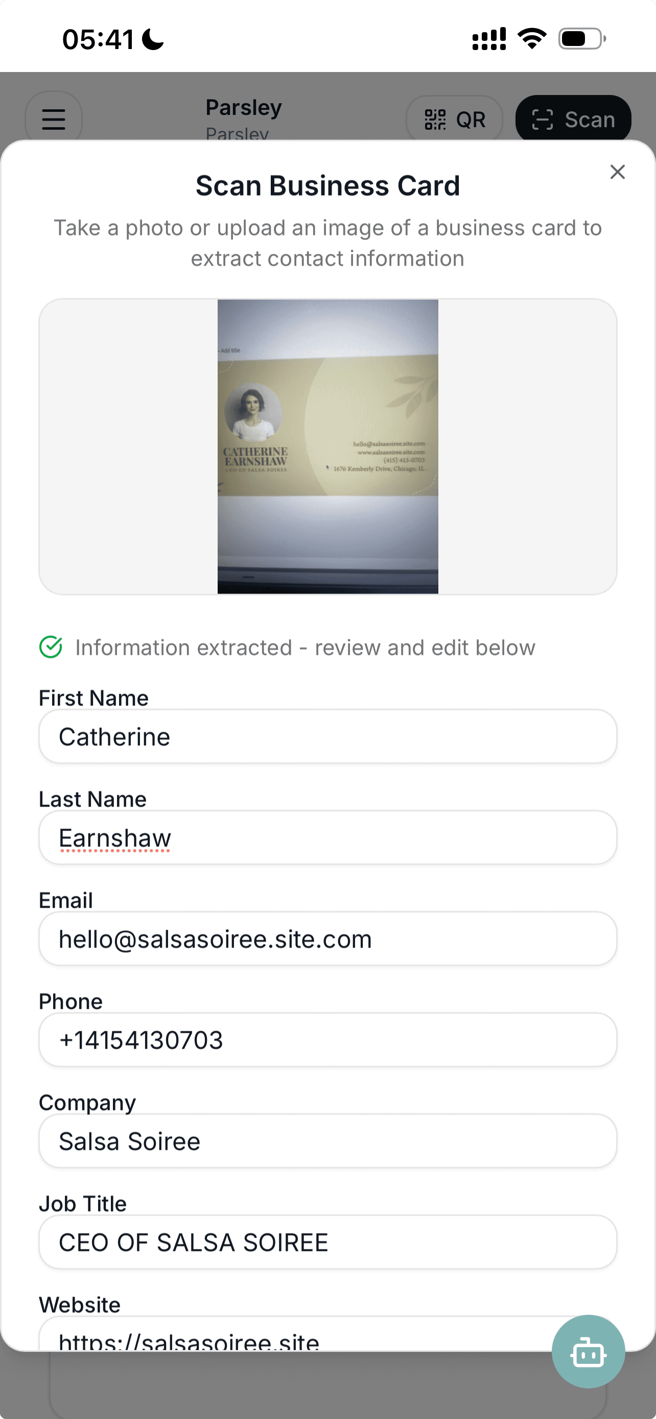 Parsley business card scanner showing extracted contact details including name, email, phone, company, and job title